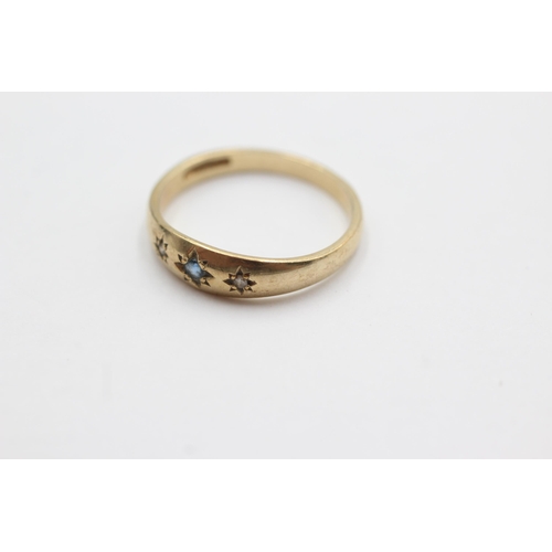 97 - 9ct gold diamond & sapphire gypsy ring (2.1g)  Size  P