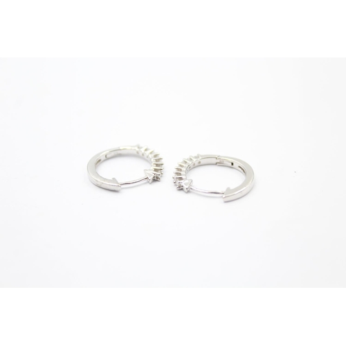 101 - 9ct white gold diamond hoop earrings (2.6g)