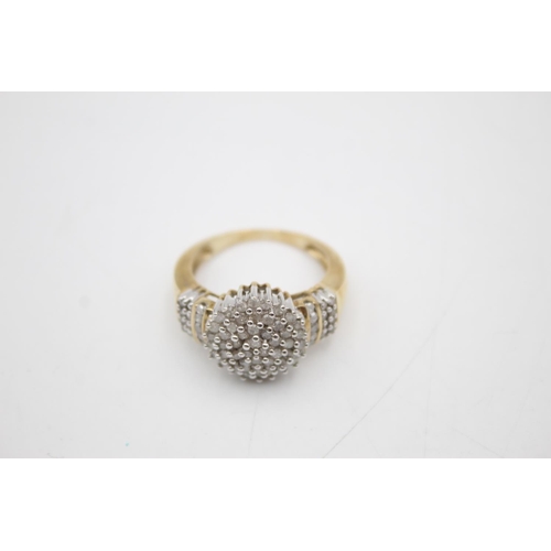 106 - 9ct gold diamond cluster ring (5.9g) Size R