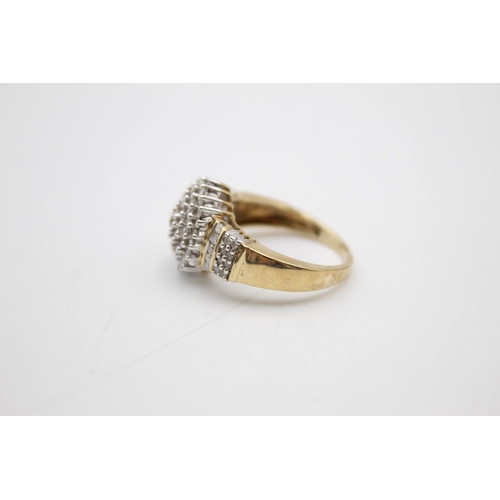 106 - 9ct gold diamond cluster ring (5.9g) Size R