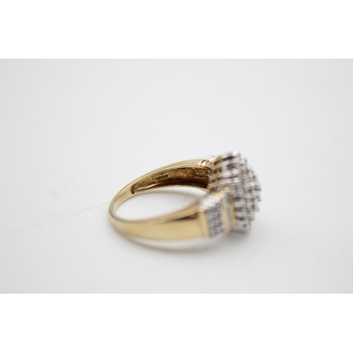 106 - 9ct gold diamond cluster ring (5.9g) Size R