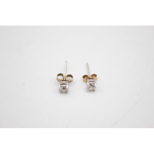 112 - 18ct white gold diamond stud earrings (0.8g)