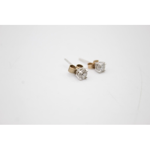 112 - 18ct white gold diamond stud earrings (0.8g)