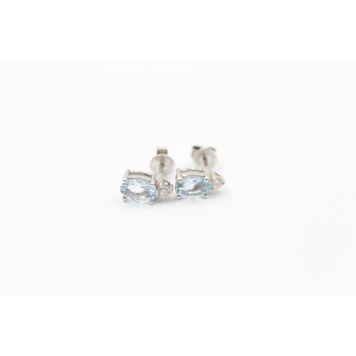 113 - 9ct white gold aquamarine & diamond stud earrings (1.7g)