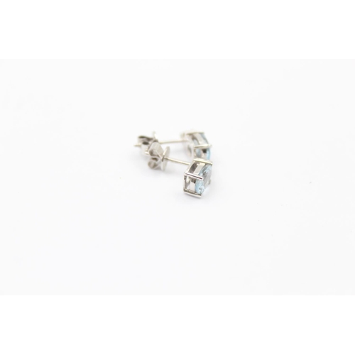 113 - 9ct white gold aquamarine & diamond stud earrings (1.7g)