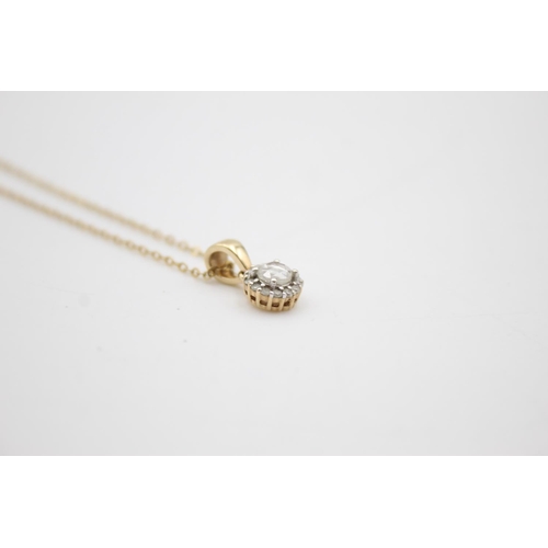 114 - 9ct gold diamond pendant necklace (1.9g)