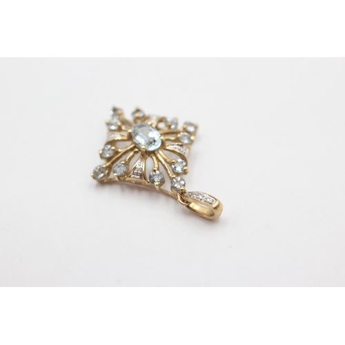 39 - 9ct gold aquamarine & diamond openwork pendant (1.8g)
