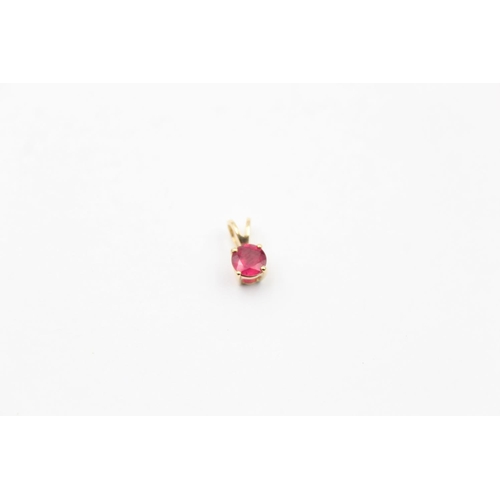 63 - 4 x 10ct gold gemstone set pendants (2.3g)