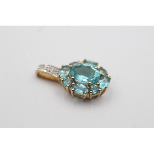 71 - 9ct gold framed diamond gemstone pendant (2.2g)