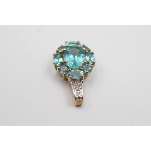 71 - 9ct gold framed diamond gemstone pendant (2.2g)