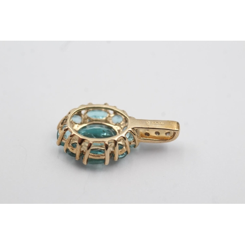71 - 9ct gold framed diamond gemstone pendant (2.2g)