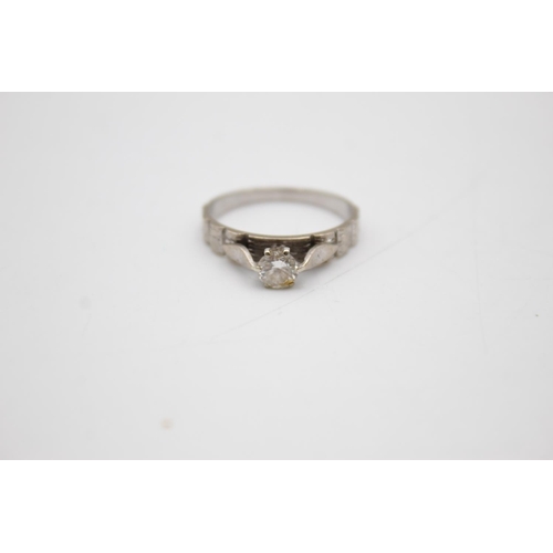 72 - 18ct gold diamond solitaire ring (3.4g) Size N