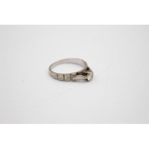 72 - 18ct gold diamond solitaire ring (3.4g) Size N