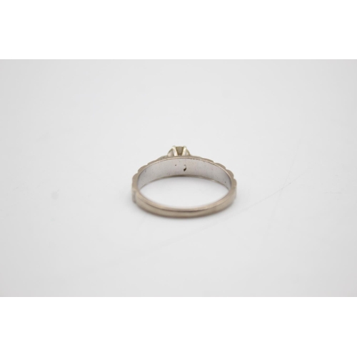 72 - 18ct gold diamond solitaire ring (3.4g) Size N