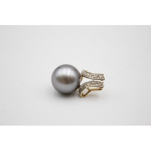 81 - 14ct gold pearl & diamond pendant (3.9g)