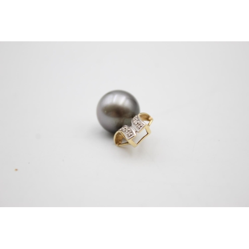 81 - 14ct gold pearl & diamond pendant (3.9g)