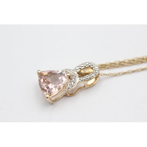 87 - 9ct gold brown gemstone & diamond pendant necklace (3.1g)