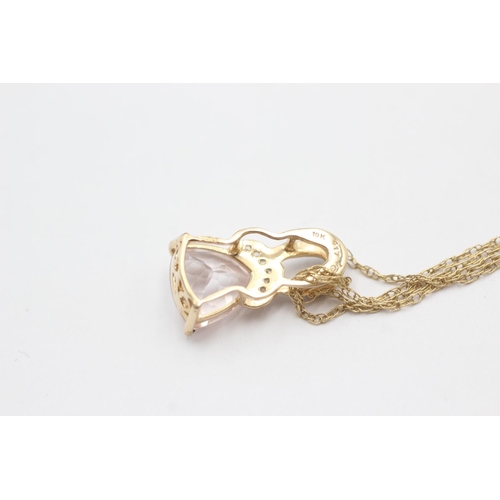 87 - 9ct gold brown gemstone & diamond pendant necklace (3.1g)