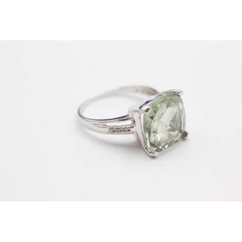 89 - 9ct white gold green gemstone & diamond cocktail ring (4.2g) Size Q
