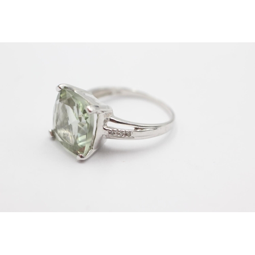 89 - 9ct white gold green gemstone & diamond cocktail ring (4.2g) Size Q