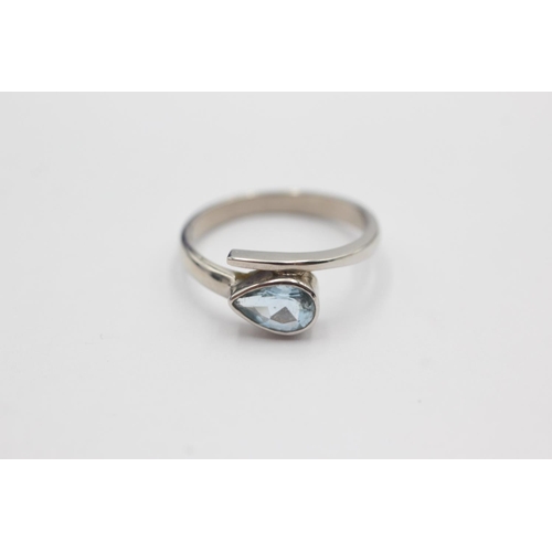 94 - 9ct white gold blue gemstone solitaire dress ring (2.6g) Size N