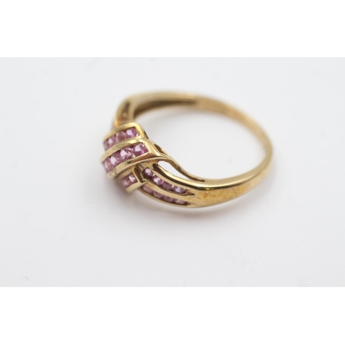 96 - 9ct gold pink gemstone channel setting ring (3.2g) Size S