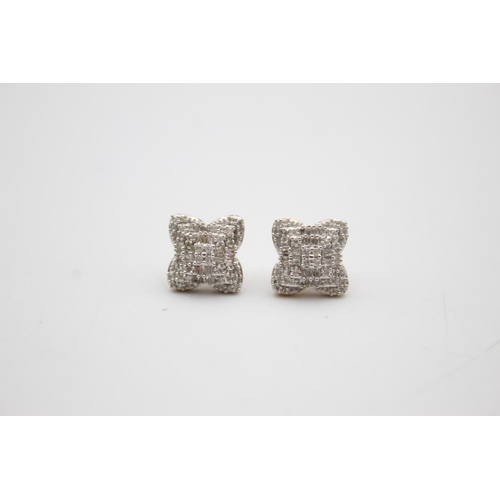 97 - 9ct gold diamond stud earrings (3g)