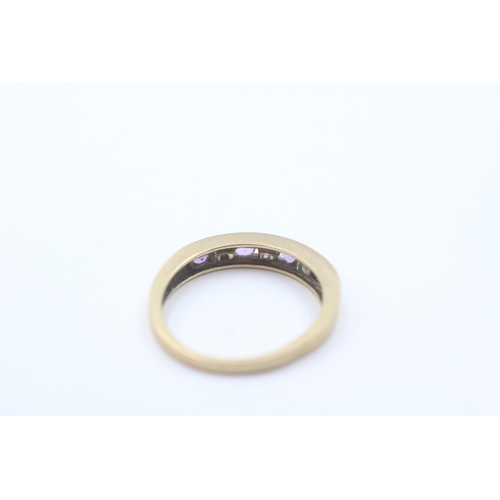 18 - 9ct gold topaz and amethyst set half eternity ring - size j1/2 (1.7g)