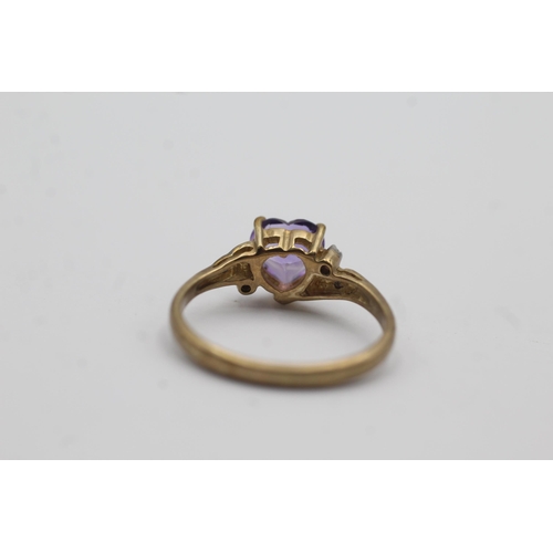 38 - 9ct gold amethyst heart ring with diamond shanks (2.1g) Size   N