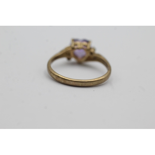 38 - 9ct gold amethyst heart ring with diamond shanks (2.1g) Size   N