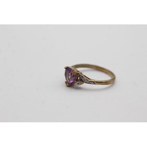 38 - 9ct gold amethyst heart ring with diamond shanks (2.1g) Size   N