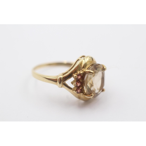 39 - 9ct gold yellow topaz & brown gemstone dress ring (4.2g) Size   O