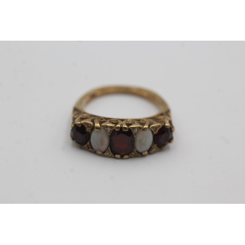 44 - 9ct gold garnet & opal five stone ring with diamond accents (4.5g) Size   N