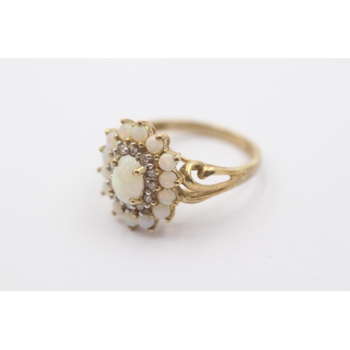 49 - 9ct gold diamond & opal halo ring (3.2g) Size   Q