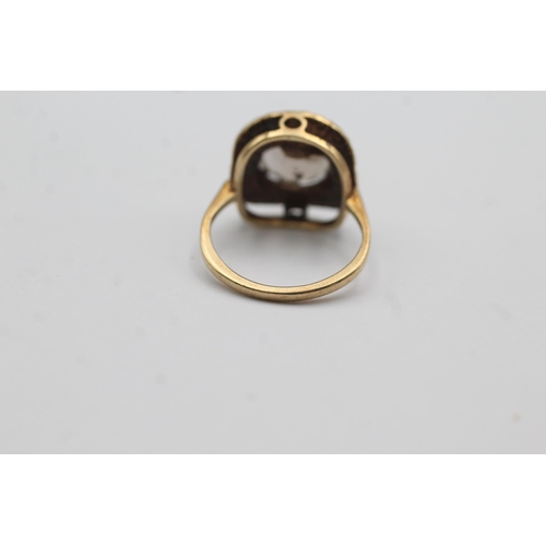 50 - 9ct gold smoky quartz dress ring with textured frame (3.1g) Size   K