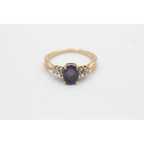 73 - 9ct gold diamond & tanzanite dress ring (2.5g) Size   O