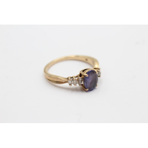 73 - 9ct gold diamond & tanzanite dress ring (2.5g) Size   O