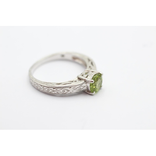 103 - 9ct white gold peridot set solitaire ring - size n1/2 (3.2g)