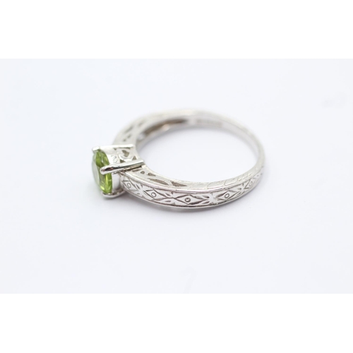 103 - 9ct white gold peridot set solitaire ring - size n1/2 (3.2g)