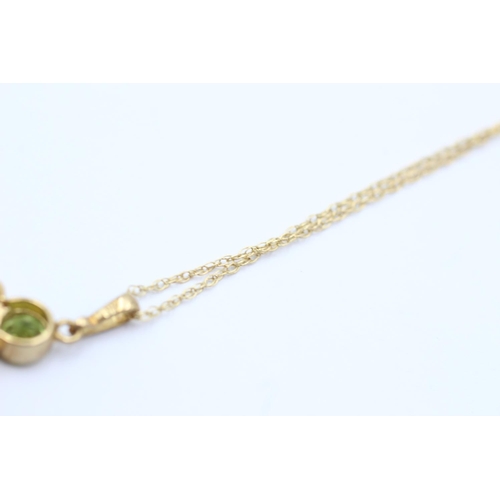 19 - 9ct gold chequer cut smokey quartz, citrine, and peridot set pendant necklace (3.4g)