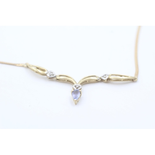 20 - 9ct gold diamond and tanzanite set static pendant necklace (3.3g)