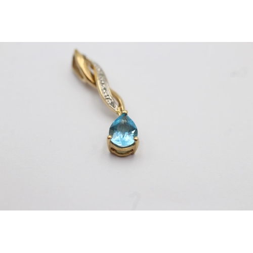 25 - 9ct gold topaz and diamond set drop pendant (1g)