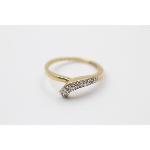 39 - 2 x 9ct gold diamond stylised stacking rings (3.4g)