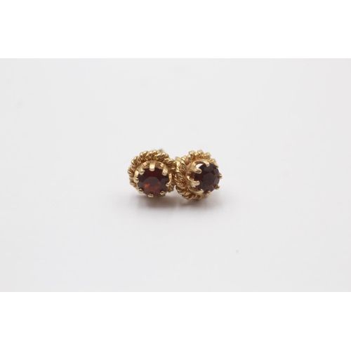 46 - 3 x 9ct gold paired gemstone stud earrings inc. amethyst, garnet & sapphire (2.5g)