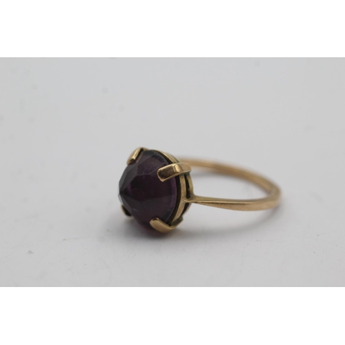 63 - 9ct gold vintage reverse set amethyst dress ring - size r (3.6g)