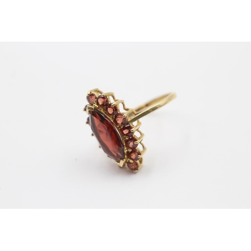 94 - 9ct gold marquise garnet cluster ring - size p1/2 (3.5g)