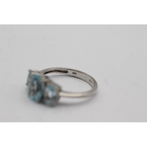 96 - 9ct white gold aquamarine set trilogy ring - size l (2.5g)