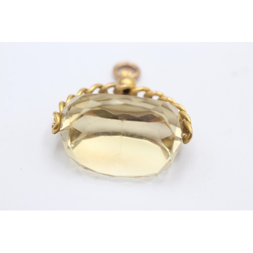 123 - 9ct gold citrine spinner fob (13.4g)