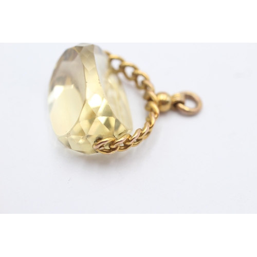 123 - 9ct gold citrine spinner fob (13.4g)