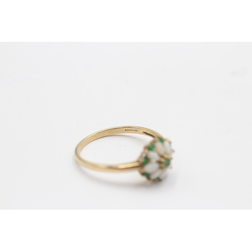 138 - 9ct gold opal & emerald halo ring (2.6g) size  V